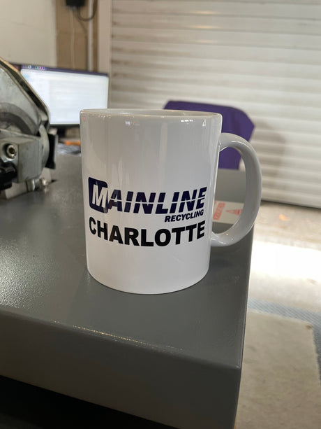 Sublimation mug being printed in workshop