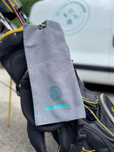 Gray towel with 'No Fuss' branding on a golf bag
